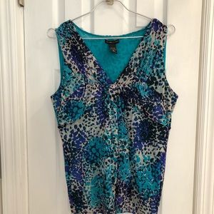 Turquoise and navy sleeveless blouse